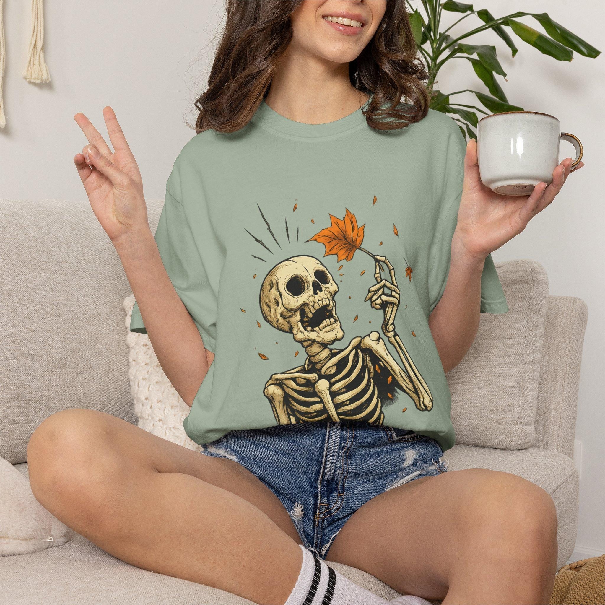 Skeleton with Falling Maple Leaf T-shirt | Autumn Skull Illustration